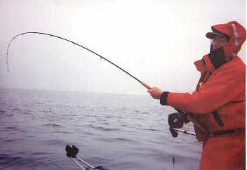 Scott on the boat off the coast of Langarra Island, B.C.