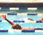 Harrison in a backstroke race