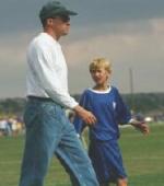 Harrison and soccer coach (Scott)