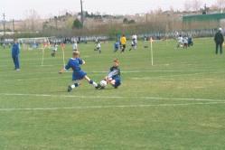 Harrison, with goal keeper challenging