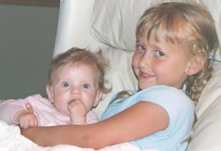 Arianne with her youngest cousin, Abigail Grace Morley (Ari and Abi)