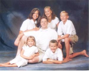 Pusey family, July 2003. From top, left, Jenifer, Lizzie, Harrison, Scott, Arianne and Will