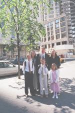 Pusey clan by a tree blocking the view of the Manhattan LDS Temple