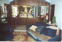 View from family room into breakfast nook and kitchen