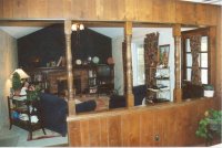 View from breakfast nook into family room. How did we live with that hideous half wall?